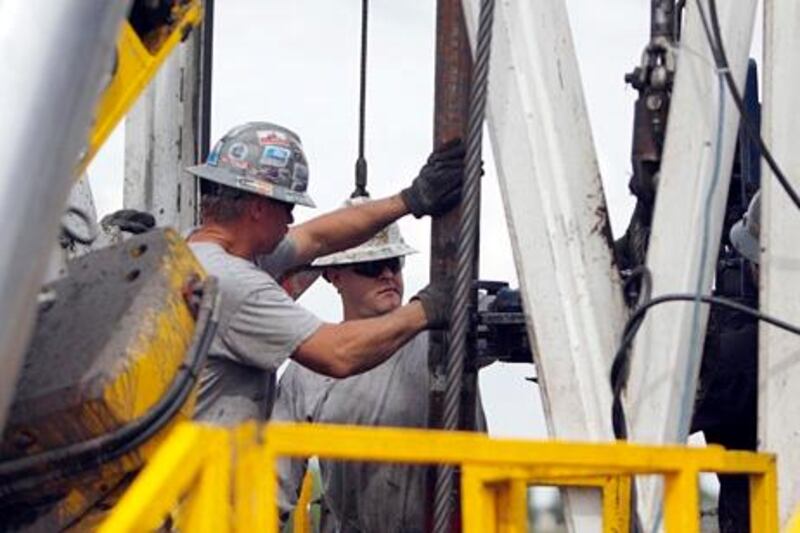 GENERIC CAPTION TO GO WITH OCB OIL SERVICES (RIG CREW SUPPLIER) THOUGHT THIS IS NOT OCB /// FILE - In this Aug. 25, 2009 file photo, crew members with Anadarko Petroleum Corp. work on a drilling platform on a farm near Mead, Colo. Oil prices hit new highs for the year Wednesday, Oct. 21, 2009, just as the dollar fell to new lows against the euro, showing how much the weak U.S. currency has come to dominate energy markets. (AP Photo/Ed Andrieski) *** Local Caption ***  NYBZ159_Oil_Prices.jpg