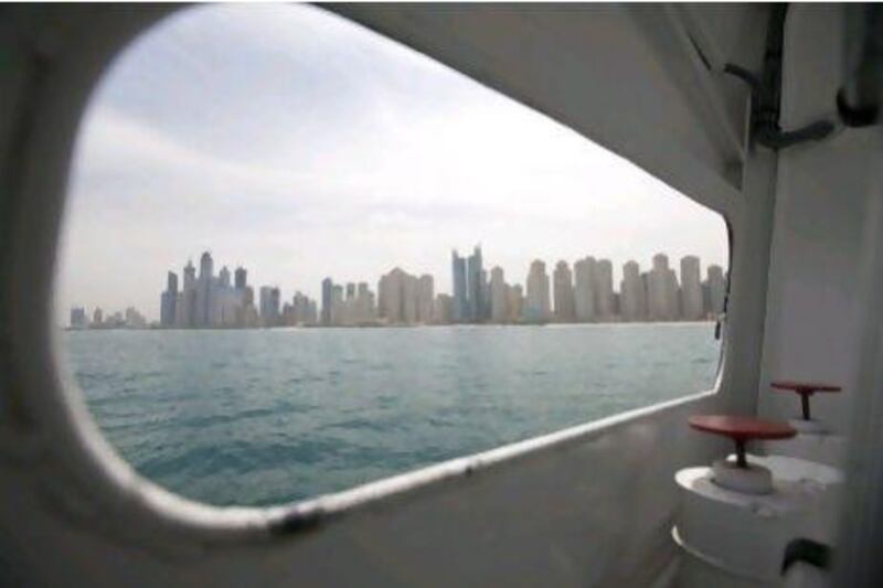 The view of the Jumeriah Beach skyline from the RTA Dubai Ferry No 1on one of its' four daily cruises, which run past the Atlantis Hotel and back to the Dubai Marina.