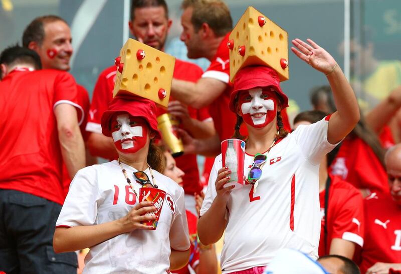 Switzerland fans cheer prior to their team's match against Honduras on Wednesday at the 2014 World Cup in Manaus, Brazil. Clive Brunskill / Getty Images