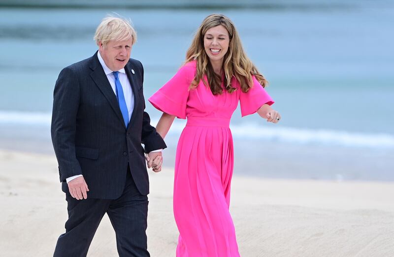 Carrie Johnson with her husband UK Prime Minister Boris Johnson at the G7 summit in Cornwall, south-west England. EPA