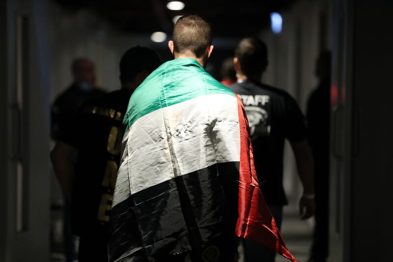 Mohammad Yahya begins his walk into the arena for his UAE Warriors Arabia Lightweight title defence against Mohamed El Jaghdal. Chris Whiteoak / The National