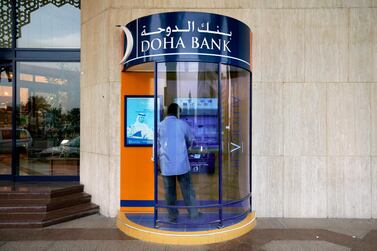  Moody's on Tuesday slashed the long-term deposit ratings of both Doha Bank and Commercial Bank of Qatar. Ryan Carter / The National 