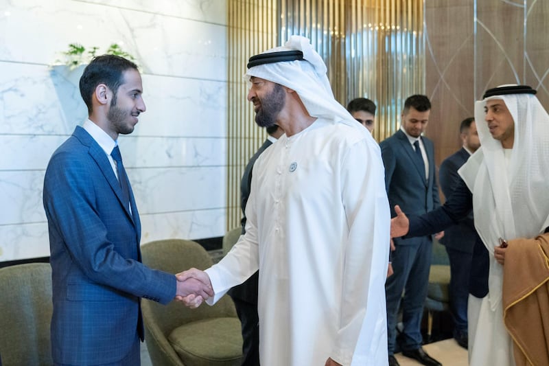ASTANA, KAZAKHSTAN - July 05, 2018: HH Sheikh Mohamed bin Zayed Al Nahyan, Crown Prince of Abu Dhabi and Deputy Supreme Commander of the UAE Armed Forces (2nd R) greets UAE students who are studying in Kazakhstan. Seen with HH Sheikh Mansour bin Zayed Al Nahyan, UAE Deputy Prime Minister and Minister of Presidential Affairs (R).

Mohamed Al Hammadi / Crown Prince Court - Abu Dhabi