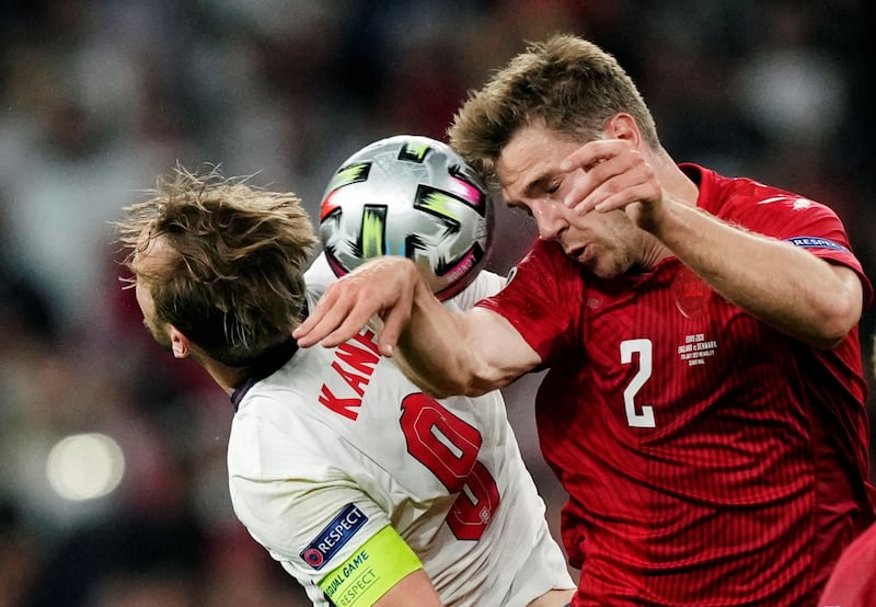 Denmark's Joachim Andersen in action with England's Harry Kane during the Euro 2020 semi-final at Wembley.