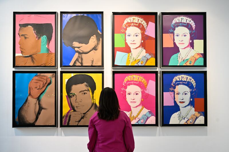 'Muhammad Ali' (1978) and 'Queen Elizabeth II of the United Kingdom' (1985) screen prints by Andy Warhol. Photo: Sothebys
