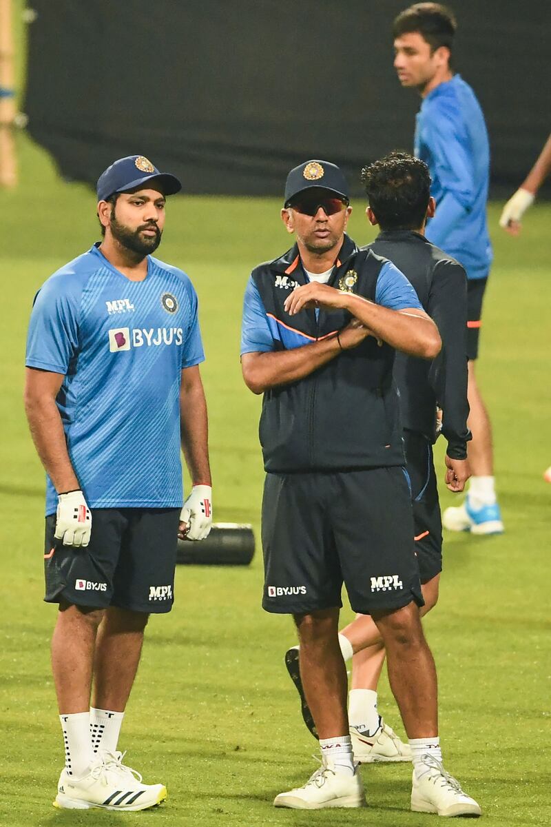 India captain Rohit Sharma with coach Rahul Dravid during training. AFP