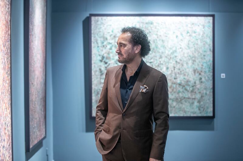 Naseer Shamma at the opening of his exhibition Half Life at the Etihad Modern Art Gallery, Abu Dhabi. All photos: Leslie Pableo for The National