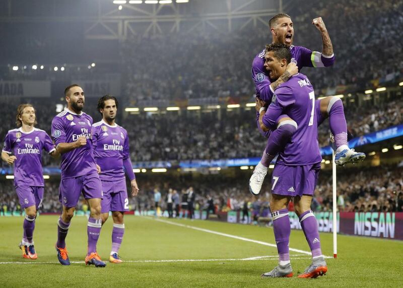 Real Madrid’s Cristiano Ronaldo celebrates with Real Madrid’s Sergio Ramos after scoring the opening goal in Madrid’s 4-1 Champions League final victory against Juventus Frank Augstein / AP Photo