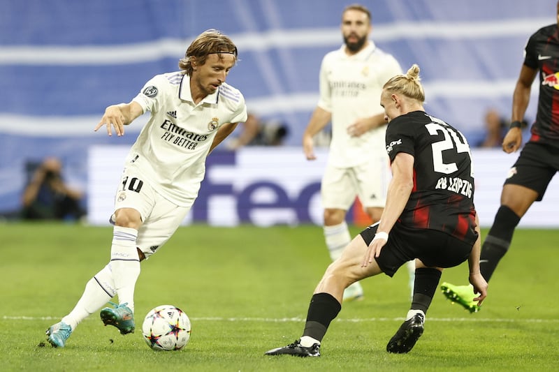 Real's Luka Modric passes the ball during the Champions League win over Leipzig. EPA