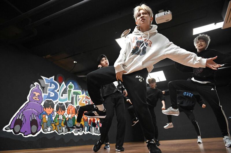 Blitzers performing during their dance practise session at a rehearsal studio in Seoul. AFP