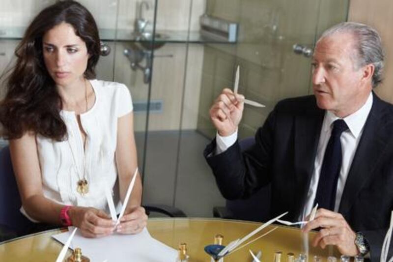 Carolina Herrera, daughter of the famous fashion designer, sits with Alberto Morillas.