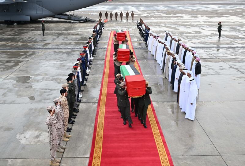 The bodies of three of the Emirati armed forces officers killed in a terrorist attack in Somalia arrive at Al Bateen Airport. A fourth officer died of his injuries after being flown back to the UAE. Wam