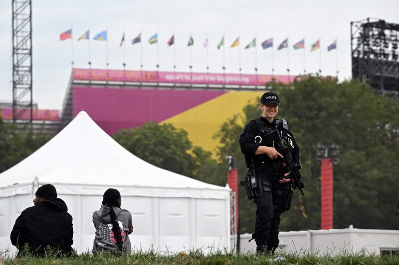 A police officer stands guard outside Alexander Stadium. AFP