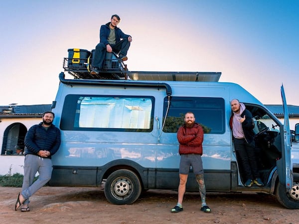 Jarred Karp, Harry Gallimore, Russ Cook and Stan Gaskell take a picture near Vioolsdrift Namibian Border. Photo: Saint Yared / Instagram