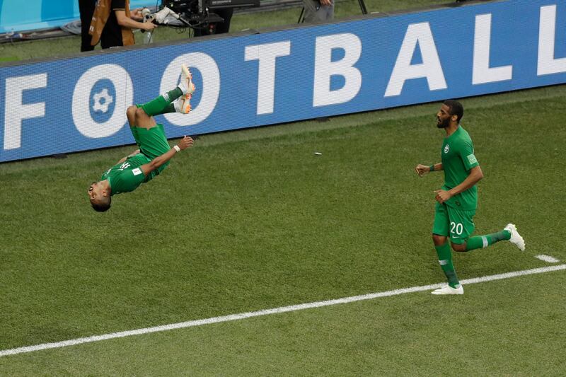 Saudi Arabia's Salem Al Dawsari, centre, celebrates his winning goal.  Themba Hadebe / AP Photo
