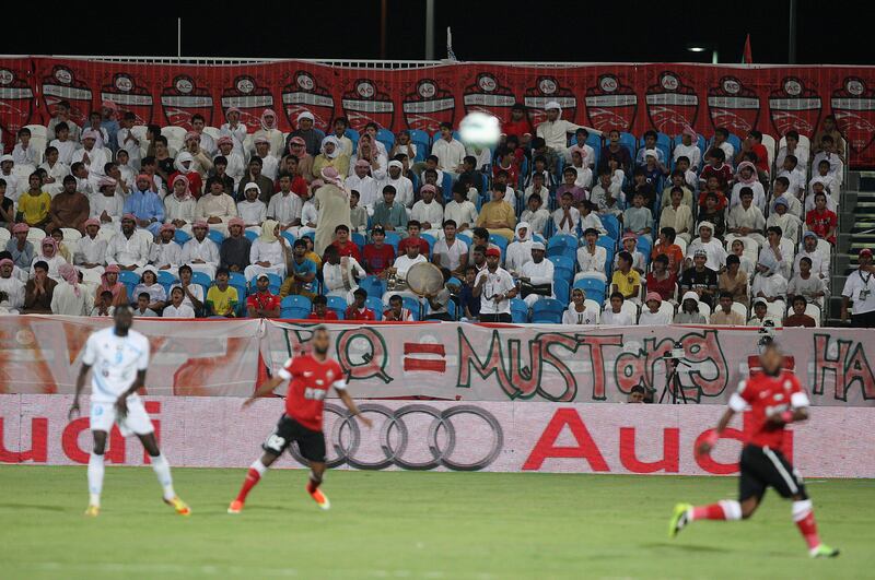 
ABU DHABI , UNITED ARAB EMIRATES Ð April 15 , 2013 : Al Ahli supporters during the Etisalat Pro - League football match between Bani Yas vs Al Ahli at Baniyas stadium in Abu Dhabi. ( Pawan Singh / The National ) For Sports
