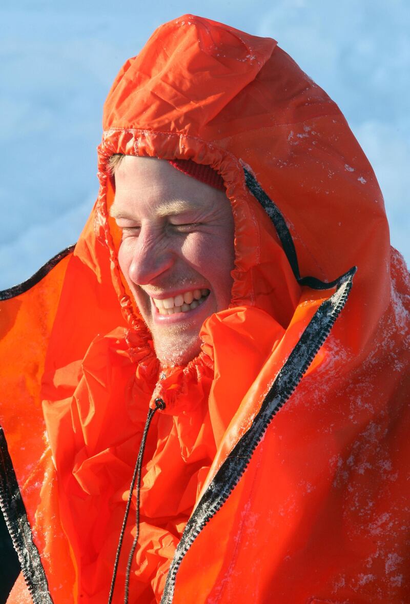 SPITSBERGEN, NORWAY - MARCH 30:  Prince Harry, part of the Walking with the Wounded expedition team, tries out an immersion suit on the island of Spitsbergen, situated between the Norwegian mainland and the North Pole, during the last days of preparation before setting off to the North Pole on foot, on March 30, 2011 in Spitsbergen, Norway.  (Photo by David Cheskin/WPA Pool/Getty Images)