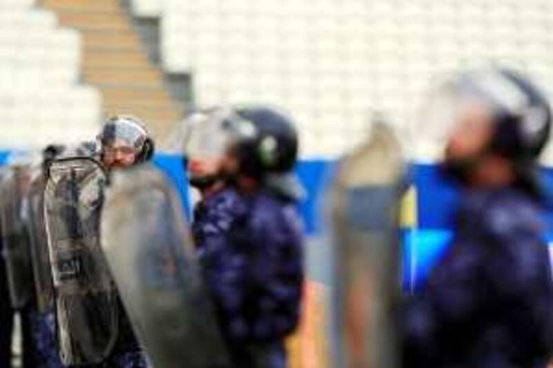 December 8, 2009 / Abu Dhabi / (Rich-Joseph Facun / The National) A day prior to the start of the FIFA World Cup, Abu Dhabi Police Officers run through a security drill at Mohammed Bin Zayed Stadium, Tuesday, December 8, 2009 in Abu Dhabi.  *** Local Caption ***  rjf-1208-FIFAsecurity003.jpg
