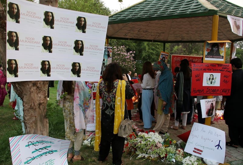 People gather during a protest for justice after a girl Noor Mukadam, was murdered in Islamabad, Pakistan. EPA