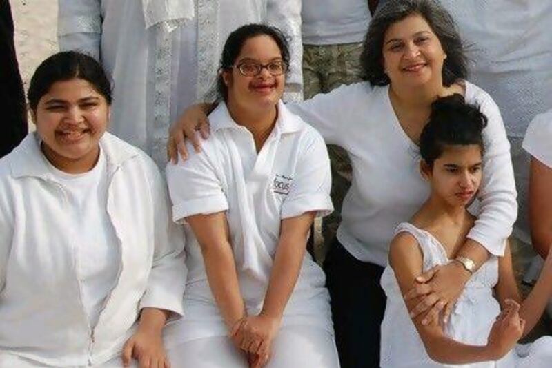 Gulshan Kavarana, front right, with her daughter, Zara, right, on an outing with special needs children.