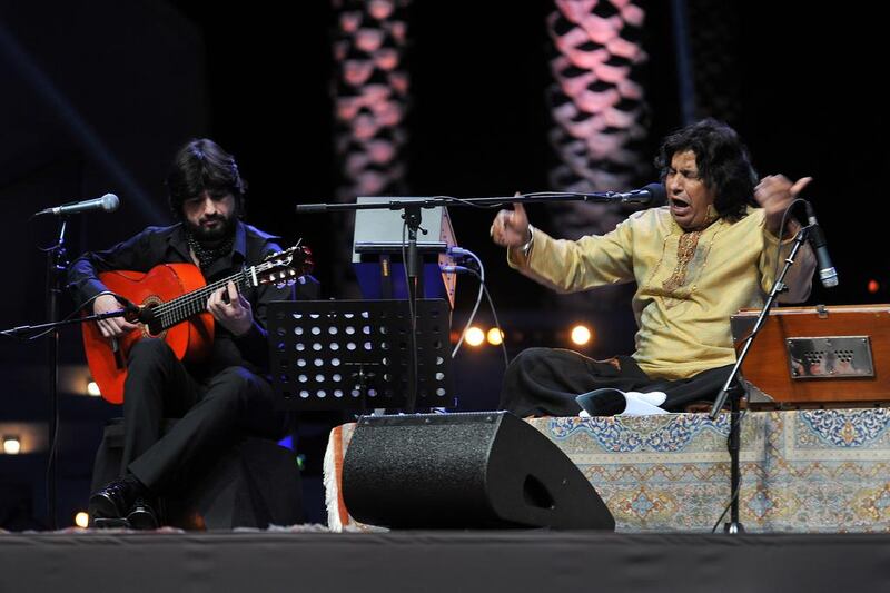 Faiz Ali Faiz, right, and Chicuelo performed with an ensemble in Mushrif Central Park on Wednesday,  January 27, 2016, in Abu Dhabi. The performance was part of the Umsiyat Series. Delores Johnson / The National