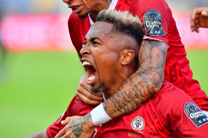 Madagascar midfielder Lalaina Nomenjanahary celebrates after scoring a goal against Nigeria at the Alexandria  Stadium in Egypt on June 30, 2019. Madagascar won the match 2-0 to advance to the last 16 of the 2019 Africa Cup of Nations. AFP