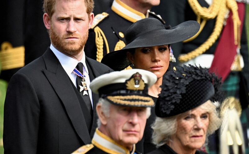 Meghan, Duchess of Sussex, cries as she, Prince Harry, Duke of Sussex, Queen Camilla and King Charles attend the state funeral and burial of Queen Elizabeth. Reuters