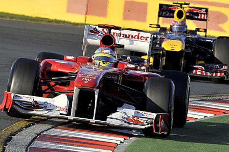 Fernando Alonso, leading Red Bull Racing's Mark Webber, is happy with Ferrari's improvement during the Australian Grand Prix.