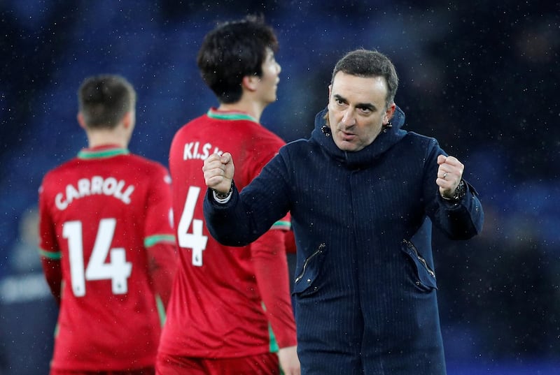 Soccer Football - Premier League - Leicester City vs Swansea City - King Power Stadium, Leicester, Britain - February 3, 2018   Swansea City manager Carlos Carvalhal celebrates at the end of the match     REUTERS/Darren Staples    EDITORIAL USE ONLY. No use with unauthorized audio, video, data, fixture lists, club/league logos or "live" services. Online in-match use limited to 75 images, no video emulation. No use in betting, games or single club/league/player publications.  Please contact your account representative for further details.