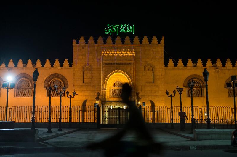 epa08312156 A man walks in front of Amr Ibn Al-As mosque in Cairo, Egypt, 21 March 2020, after the Egyptian government decided to close the mosques and churches as part of the country's efforts to prevent Covid-19. Countries around the world are taking increased measures to stem the widesprea?d of the SARS-CoV-2 coronavirus causing the Covid-19 disease.  EPA-EFE/MOHAMED HOSSAM