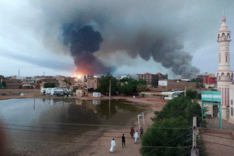 Smoke over Khartoum on Wednesday as fighting in Sudan shows no signs of abating.  AP