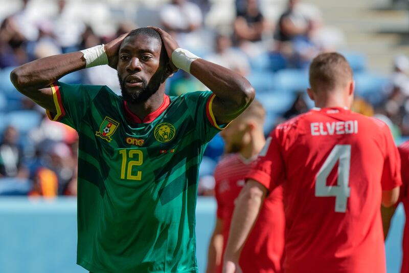 Cameroon's Karl Toko Ekambi gestures after missing a chance. AP