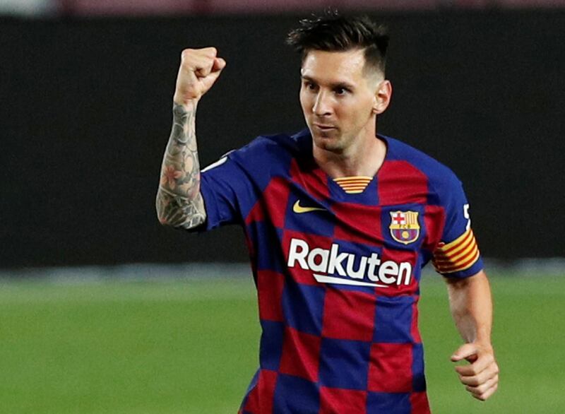 Lionel Messi celebrates scoring Barcelona's second goal in their 2-2 draw with Atletico Madrid at Camp Nou on Tuesday, June 30. Reuters