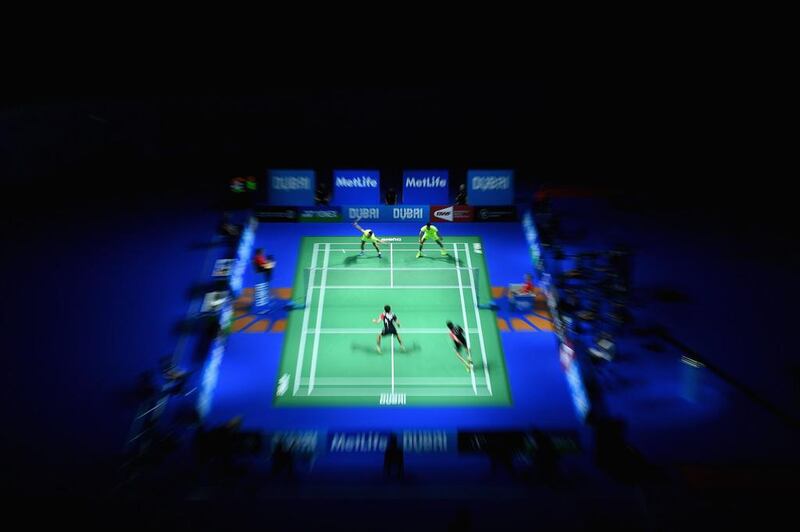 Chai Biao and Hong Wei of China in action against Lee Yong Dae and Yoo Yeon Seong of South Korea in the men’s doubles final at the BWF Destination Dubai World Superseries Finals at the Hamdan Sports Complex on December 21, 2014 in Dubai. Christopher Lee / Getty Images
