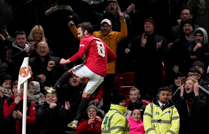 Manchester United's Juan Mata celebrates scoring the only goal. Reuters