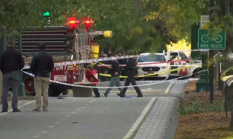 In this still image taken from video, police and ambulances respond after a motorist drove onto a busy bicycle path near the World Trade Center memorial and struck and killed several people Tuesday, Oct. 31, 2017 in New York. (AP Photo)