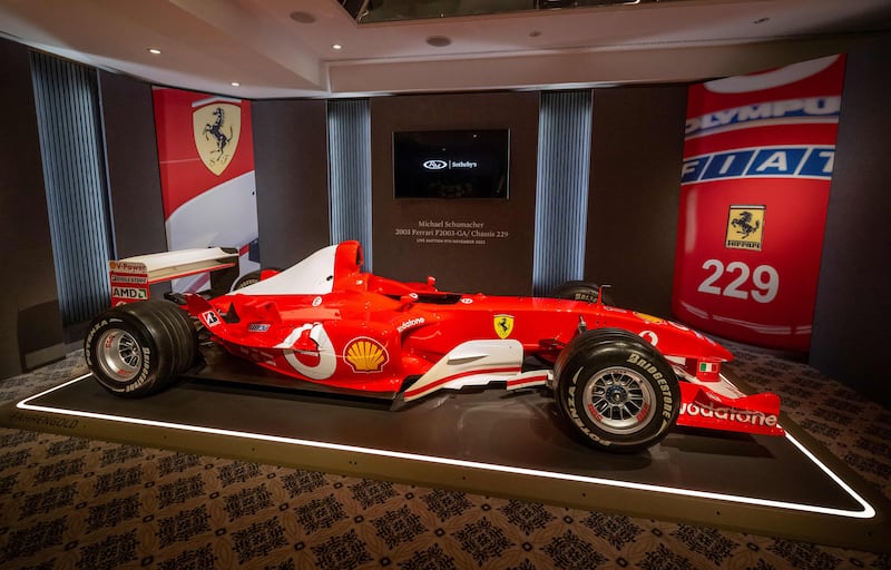 German F1 world champion Michael Schumacher's F2003 GA during Sotheby's auction house preview in Geneva. AFP