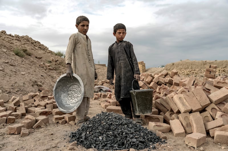 Children are involved in every step of the brickmaking process. 