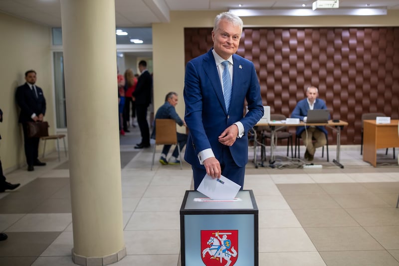 Mr Nauseda casts his vote in Vilnius, Lithuania. AP