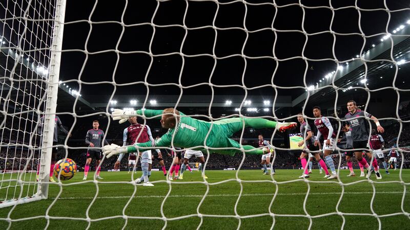 Aston Villa's Ezri Konsa scores their side's first goal of the game. PA