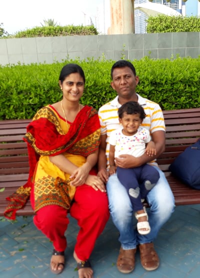 Deepa Kumar with his wife Athira and their daughter Amulya. Both mother and daughter survived the crash. Photo: Kumar family

