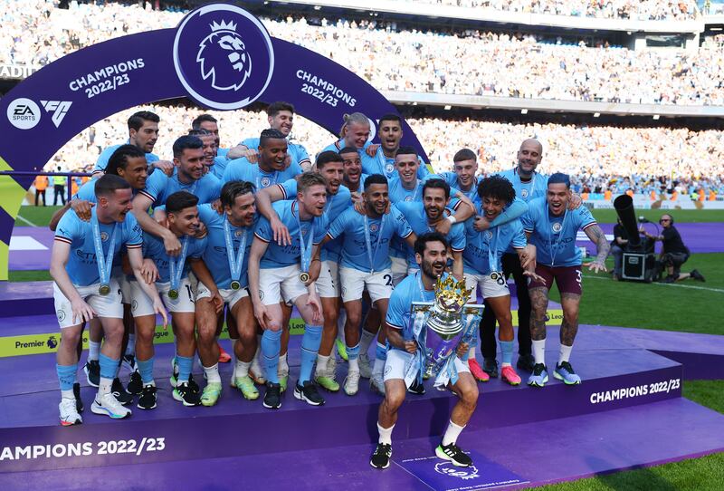 Manchester City captain Ilkay Gundogan lifts the Premier League trophy after their victory over Chelsea at the Etihad Stadium on May 21, 2023. Reuters