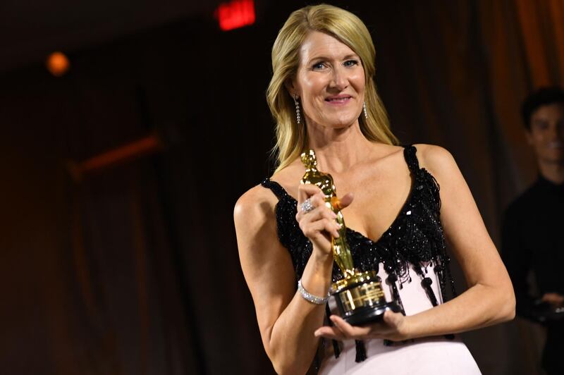 Laura Dern poses with her engraved award for Best Actress in a Supporting Role for "Marriage Story" at the Governors Ball after the Oscars on Sunday, February 9, 2020, at the Dolby Theatre in Los Angeles. AFP
