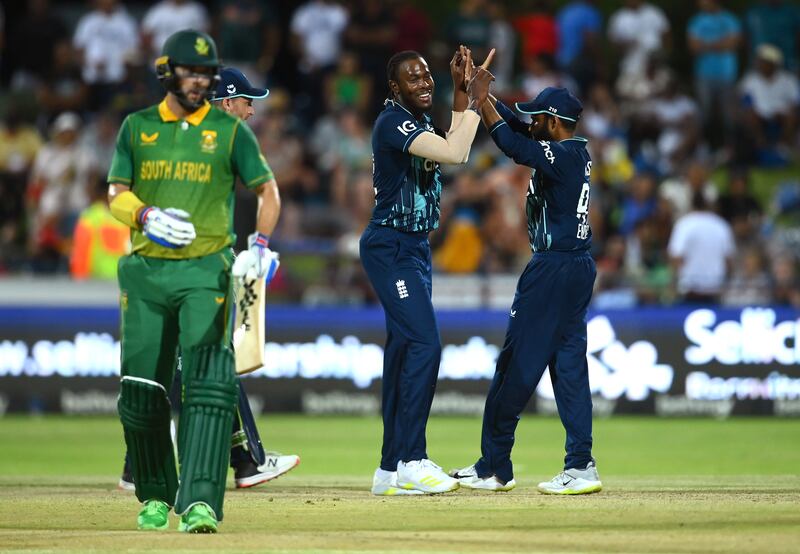 Jofra Archer celebrates with Adil Rashid after taking the wicket of Heinrich Klaasen. Getty