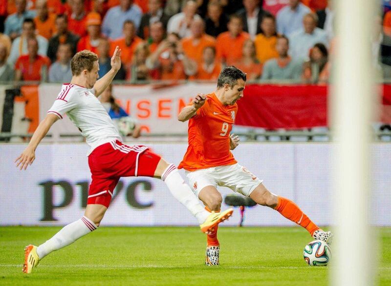 Dutch player Robin van Persie in action against Wales during an international friendly on Wednesday ahead of the Netherlands' participation at the 2014 World Cup in Brazil. Robin van Lonkhuijsen / EPA / June 4, 2014  