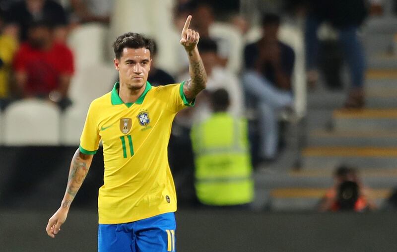 Brazil's Philippe Coutinho celebrates after scoring their second goal. Reuters