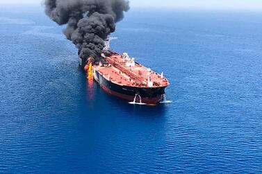 Smoke billows from a tanker that has been attacked in the waters of the Gulf of Oman. AFP