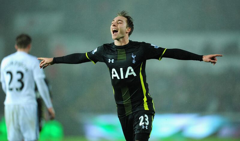 SWANSEA, WALES - DECEMBER 14:  Spurs player Christian Eriksen celebrates after scoring the second Spurs goal during the Barclays Premier League match between Swansea City and Tottenham Hotspur at Liberty Stadium on December 14, 2014 in Swansea, Wales.  (Photo by Stu Forster/Getty Images)