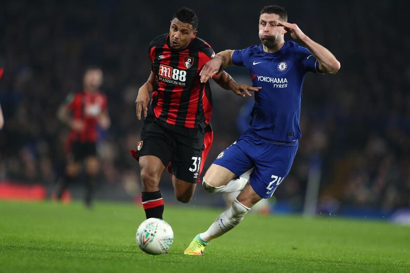 Bournemouth's Lys Mousset attempts told hold off Chelsea's Gary Cahill. Catherine Ivill / Getty Images.