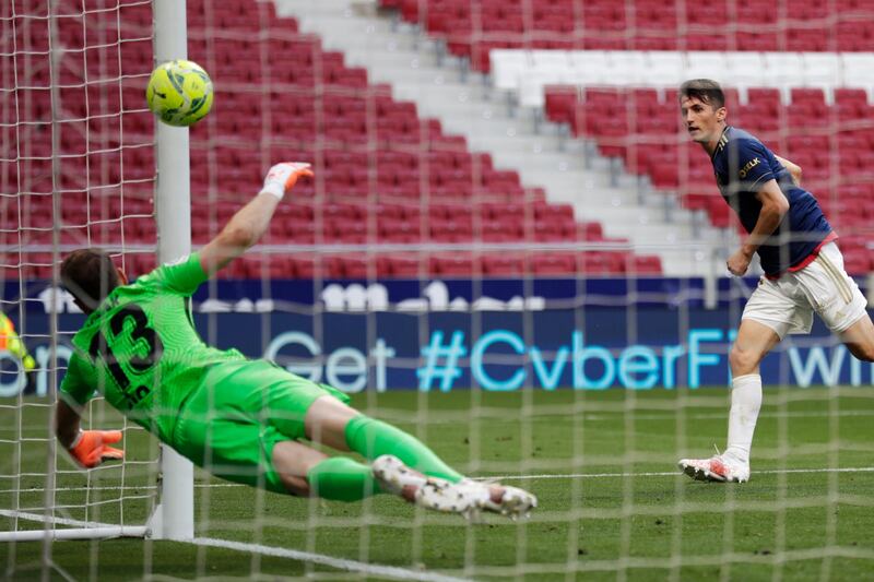 Ante Budimir scores the opening goal for Osasuna against Atletico Madrid. AP